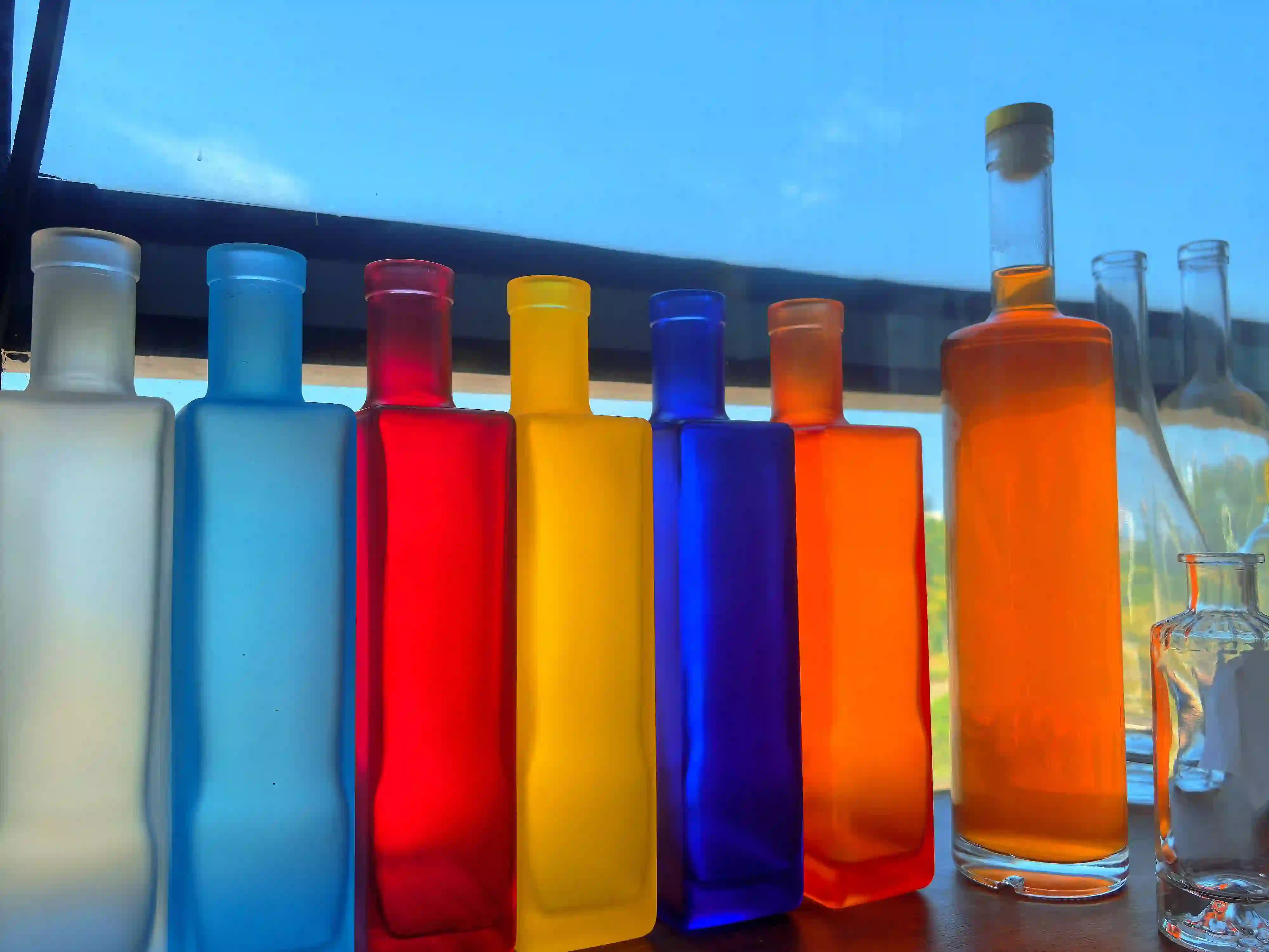 700ml Frosted & Colored Glass Bottles | Wholesale Spirit Bottles Manufacturer